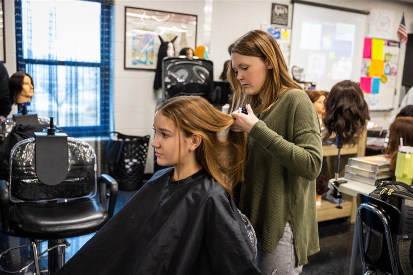 Centennial High students in the cosmetology class